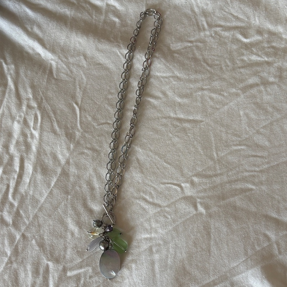 Lia Sophia Silver Necklace with Green and Black Charms, can wear long or short.